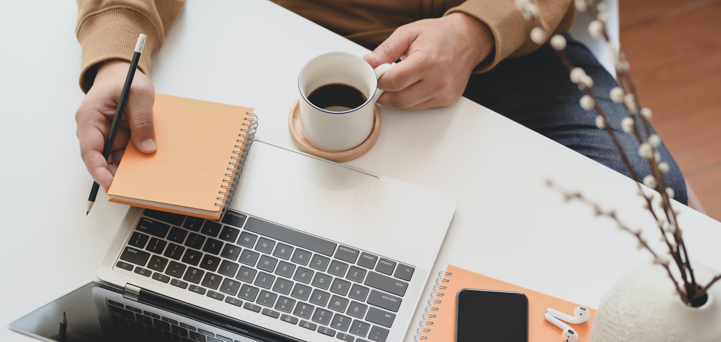 Man working on laptop planning website development