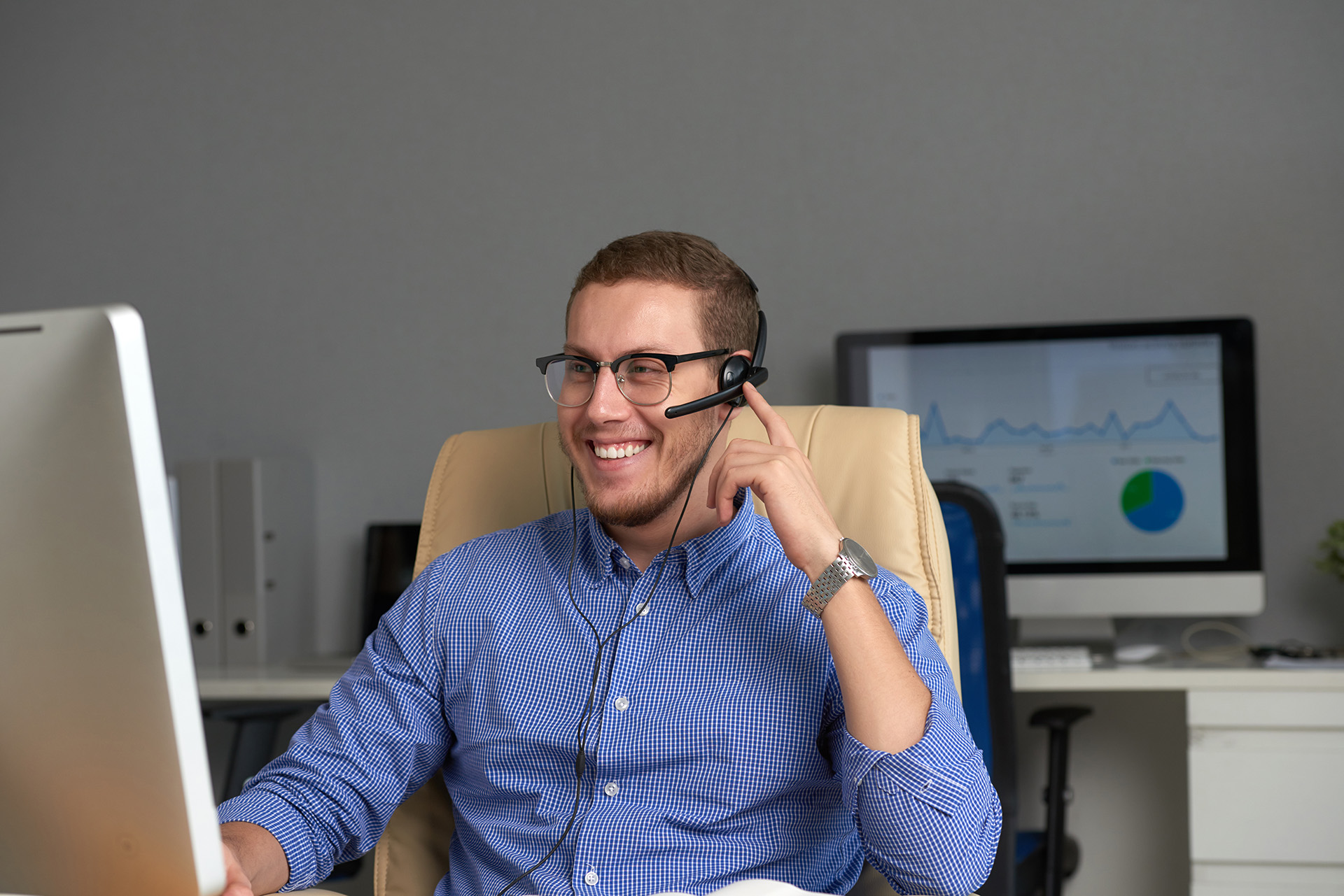 Happy businessman working in office